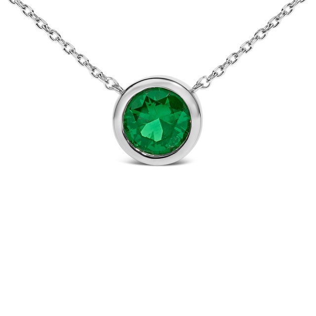 Imbued with captivating radiance, this exquisite pendant necklace combines the timeless allure of .925 sterling silver...
