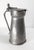 We are selling this 19th century Continental European pewter pitcher. This pitcher has nice simple form with acorn form...