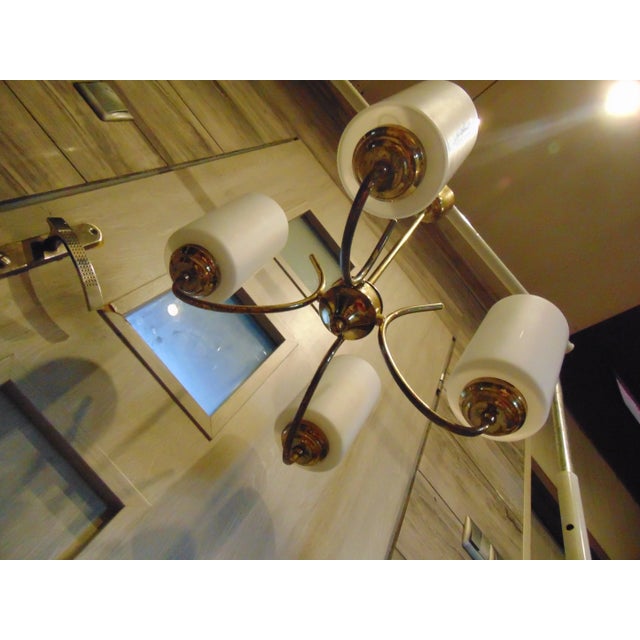 Vintage brass chandelier from the 1950s-1970s, dimensions: height 58 cm, diameter 44 cm. European Plug (up to 250V).The...