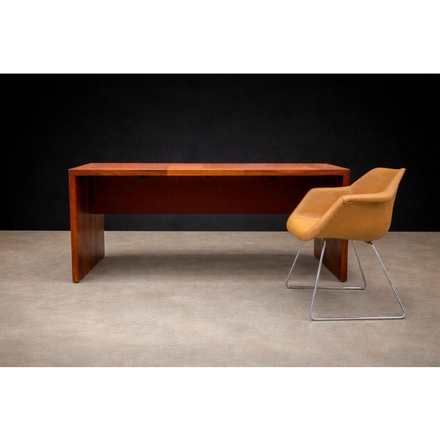 Designed by Jorge Zalszupin (1922–2020) and produced by his own company L’Atelier, this foldable desk exemplifies the...