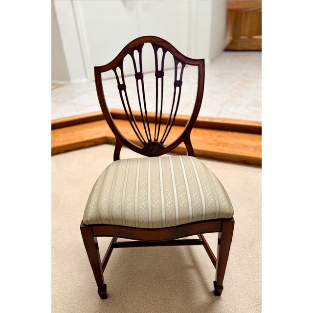 Excellent proportions, timeless design, and outstanding craftsmanship define the heirloom-quality dining table and chairs...