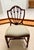 Excellent proportions, timeless design, and outstanding craftsmanship define the heirloom-quality dining table and chairs...