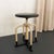 This handsome, early 20th century, industrial, apothecary stool is circa the 1930s. The stool combines a bent tubluar...