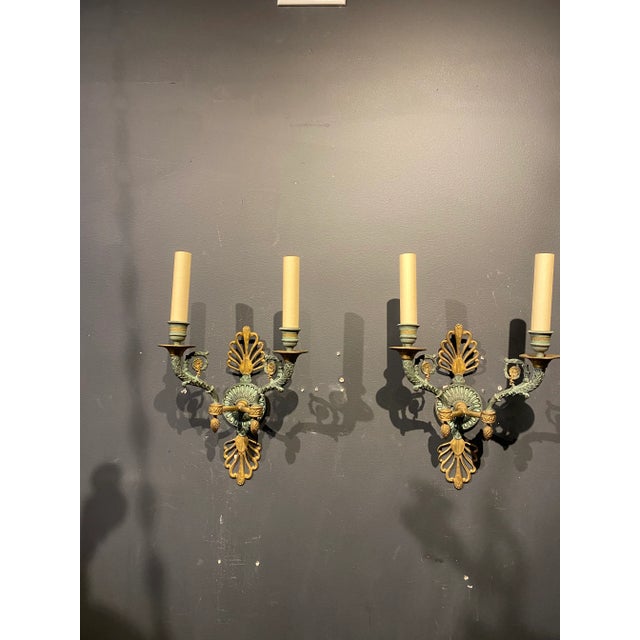Beautiful pair of period empire sconces with green patina finish