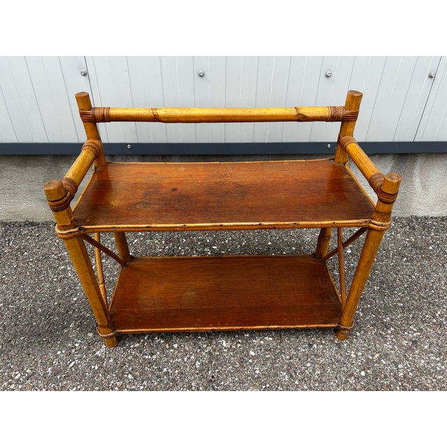 1970s rattan shelf standing on legs