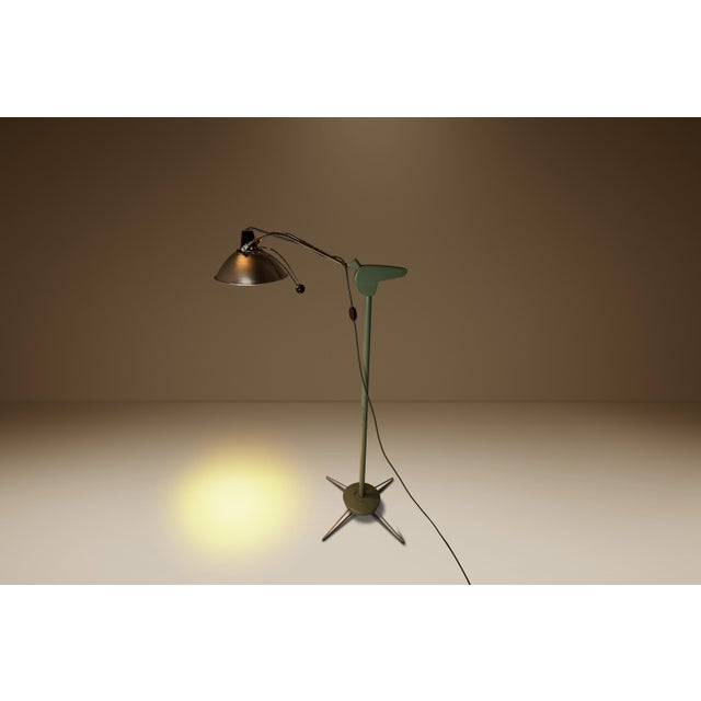 Introducing an authentically vintage Mid-Century Modern surgical lamp in character rich patina. Built from solid steel by...