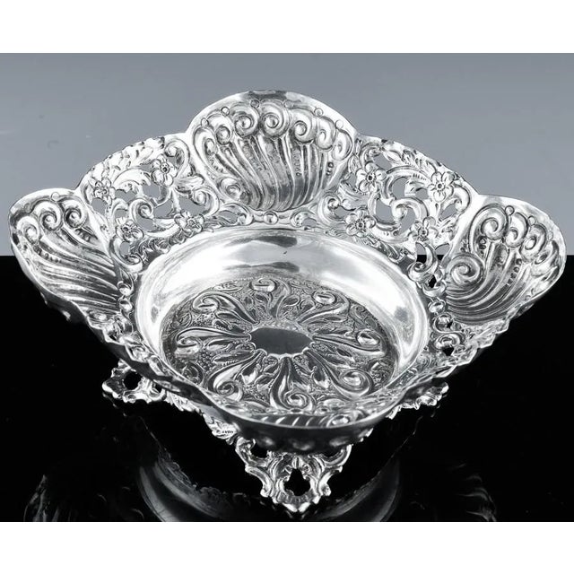 Beautiful sterling silver repoussé nut dish from the Victorian period. Intricate scrolling and floral designs, raised on...