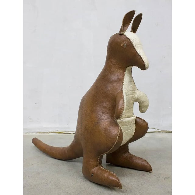 This fantastic sturdy vintage leather kangaroo is from the 60s in the style of dimitri omersa. Country of origin england....