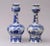 Pair of Dutch Delft blue and white onion bulb vases decorated with Chinese and European figures, horses, trees and hollow...