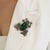 The Vintage-Style Hollywood Regency Emerald, Ruby & Diamond Frog Brooch Pendant is crafted in 925 sterling silver and...