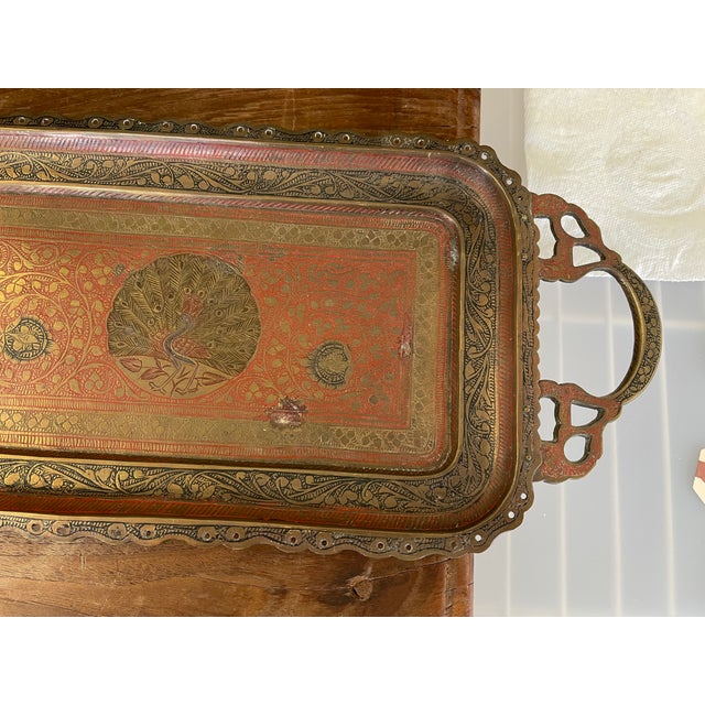 Beautifully crafted vintage rectangular serving tray featuring intricate hand-etched inlay work. The design showcases...
