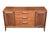 Timeless Mid-Century Modern design meets exceptional craftsmanship in this beautifully restored walnut credenza....