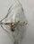 A pair of wall lamps with a brass frame and a thick, clear Murano glass diffuser. They take a small bulb. I have official...