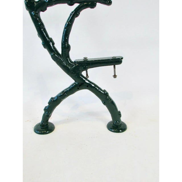 Heavy cast iron garden bench frames . Faux bois style of knotty tree branches . Saved from a Detroit area estate ....