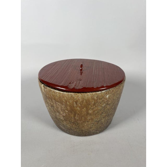 Glazed stoneware water vessel with lacquer lid, Japan, Edo period (1615-1868) The round, flared water vessel (used for the...