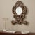 Dimensions: 16" W x 1" D x 24" H This intricately hand carved vintage mirror wears a distressed finish. Beautiful as a...