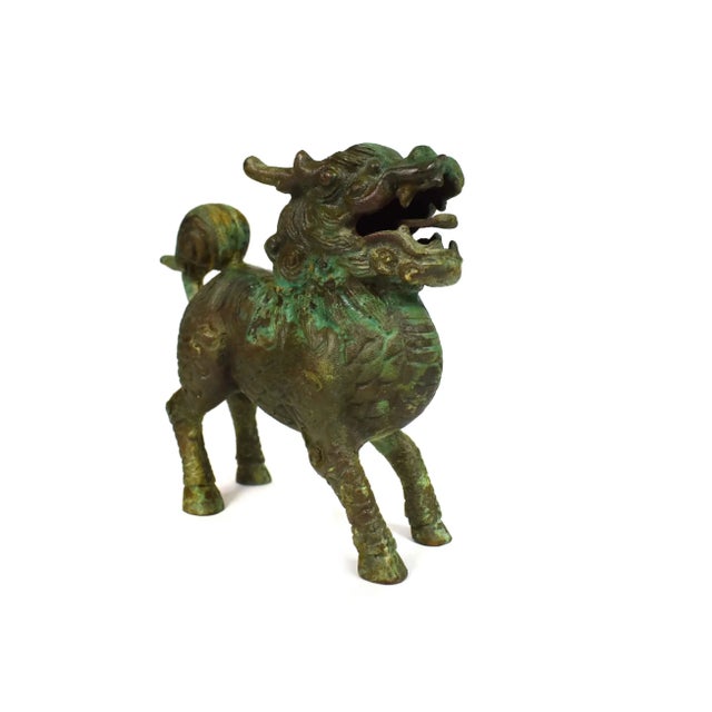 Suanni (狻猊) is a mythical Chinese beast that looks like a lion and said to be one of dragon's nine sons. Suan Ni resembles...