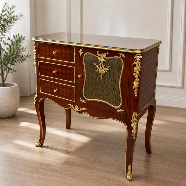 Add timeless European elegance to your interior with this exquisite French Louis XV-style chest of drawers, crafted from...