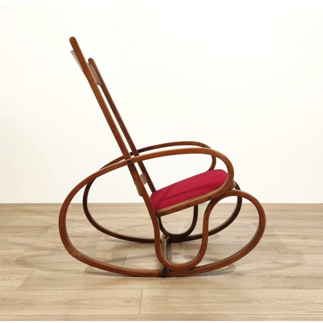 Steam-bent wood rocking chair produced by Jacob and Josef Kohn, designed by Gustav Siegel. The chair appears in the 1906...