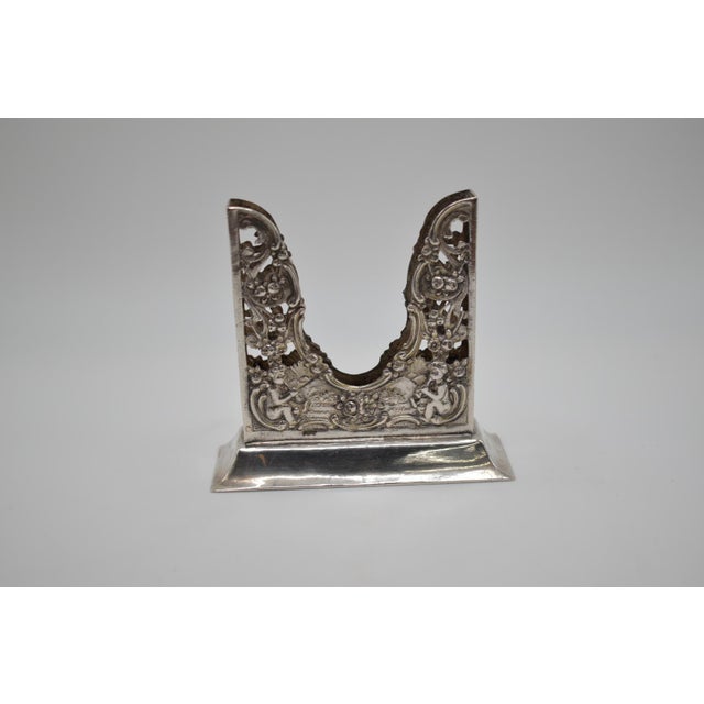 This is an adorable 1920s sterling silver Venetian, Art Deco cigarette holder. It depicts cherubs and a lovely floral...