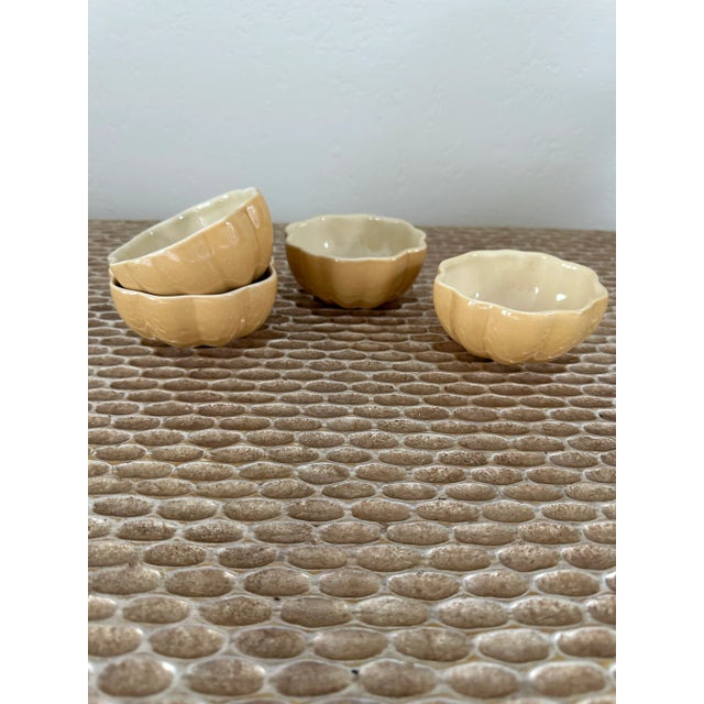 Fabulous set of four pumpkin squash bowls in ceramic by Williams Sonoma, dating to the 1990’s. Gorgeous rich neutral...