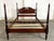 This full size mahogany four poster bed frame by Dixie features tall carved posts with reeded detailing, turned accents,...