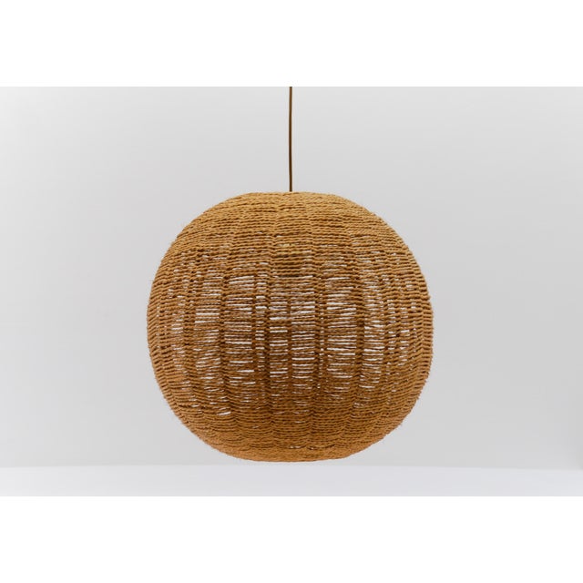 Huge and rare decorative Mid-Century Modern pendant lamp. Designed and manufactured probably in Scandinavia, 1960s. The...