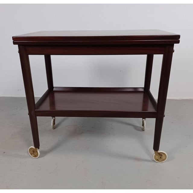 1960s ole wanscher restored mulitfunctional rungstedlund mahogany side table. the sidetable consist of an adjustable...
