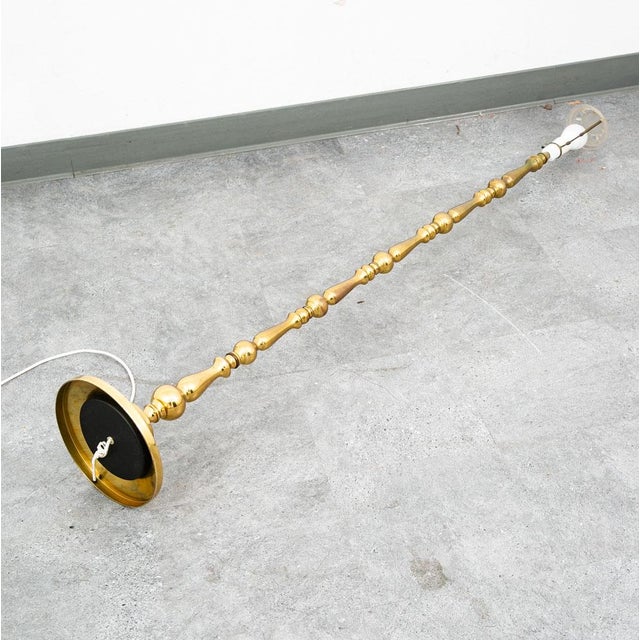 Brass ornate floor lamp. well made and recently imported from Denmark.