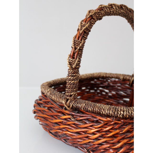 Vintage Woven Willow Basket With Wrapped Arched Handle For Sale - Image 9 of 14