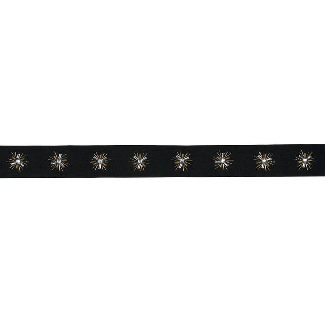 Constellation Beaded Tape in linen features oxidized beads at the center of elegant starbursts, hand-embroidered in...