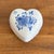 Charming tiny porcelain heart shaped box with hand-painted blue and white florals. Most items found at Pub & Oasis are...