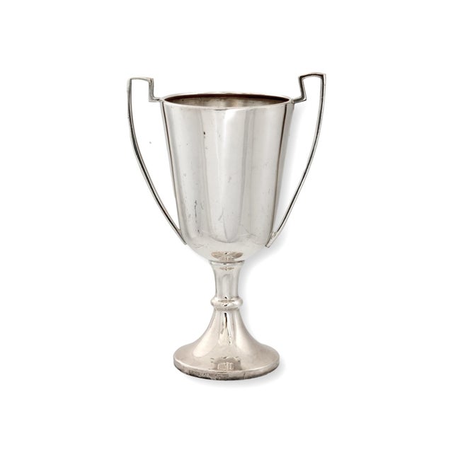 English silverplate trophy dated 1950 and engraved for the Greenwich & Blackheath Horse Show & Gymkhana in London. The...