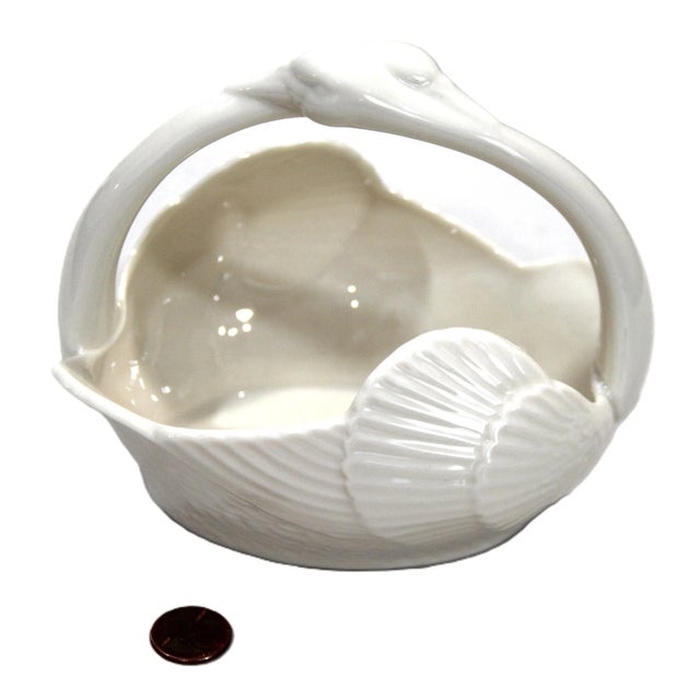 Very unusual double swan handle candy bowl by Lenox. Very elegant piece in excellent condition.