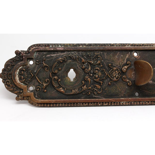 Antique Victorian brass Sargent signed pull with a lock feature and thumb latch. The original mounting screws are not...
