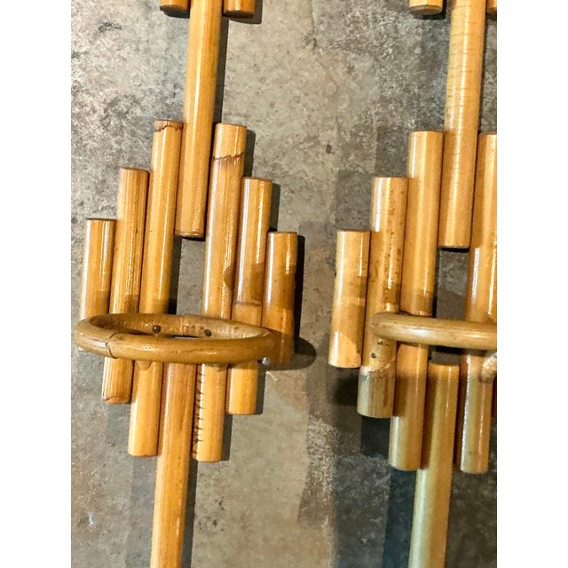 Infuse your vertical space with organic texture and laid-back island charm using this striking pair of vintage rattan wall...