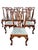 A set of 6 antique dining chairs. Chippendale style chairs with carved knees with claw and ball feet. The seats pop out...