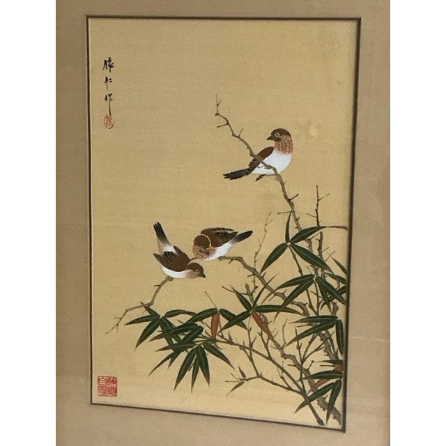 Pair of Chinese bird-and-flower paintings, ink and color on silk. One depicts sparrows perched among bamboo; the other,...