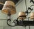 A very attractive piece in the french Country style, the light is made in wrought iron and comes with its original painted...