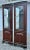 Lovely pair of solid cherry corner cabinets by Jasper cabinet company. These diminutive cabinets feature glass fronts ,...