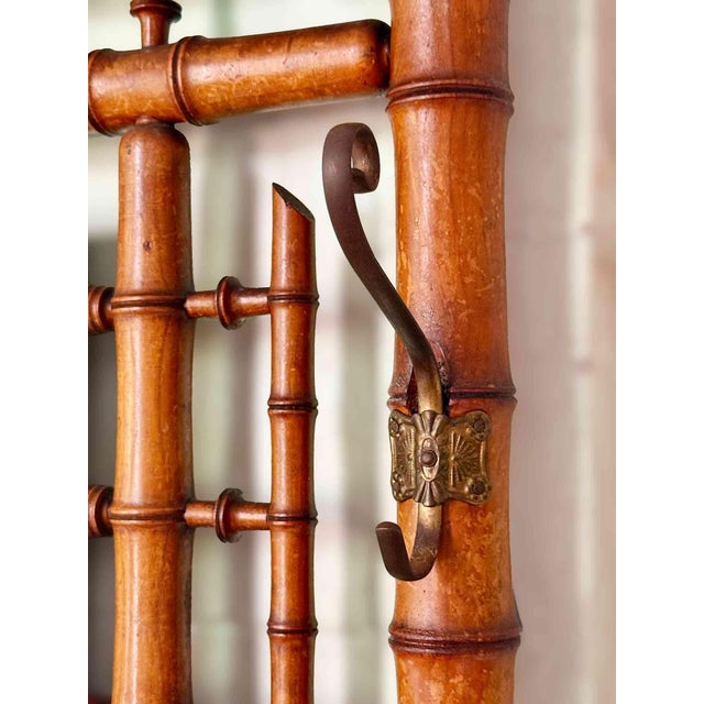 Antique 19th-century French Victorian hall stand with faux bamboo painted finish. It features a Chinese...