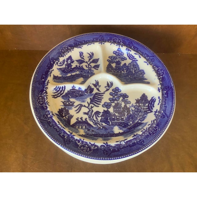 Made in Japan by Moriyama; traditional design on heavy ceramic; note the sections meet in a curved middle