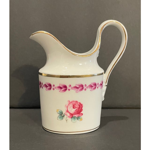 Richard Ginori 1735 porcelain pitcher / creamer in the Camellia pattern. 4.25 inches H Marked on the bottom.