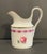 Richard Ginori 1735 porcelain pitcher / creamer in the Camellia pattern. 4.25 inches H Marked on the bottom.