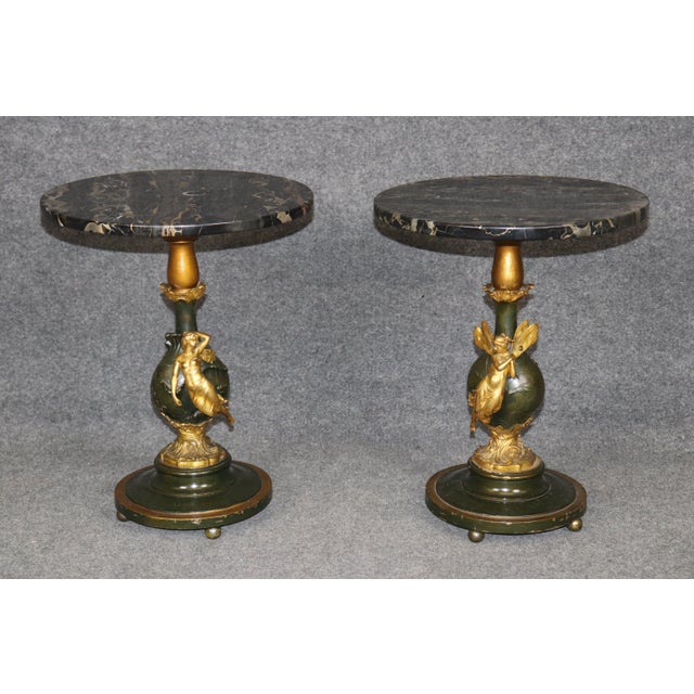 An exceptional and highly decorative pair of 19th century Art Nouveau end tables signed Ferville-Suan, masterfully...