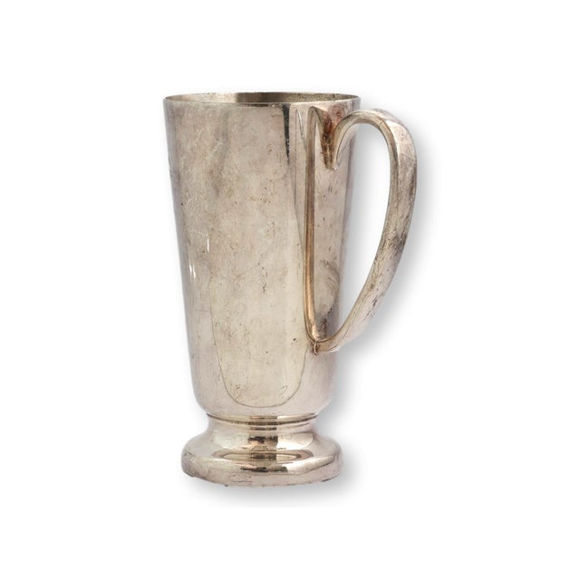 English silverplate trophy cup engraved for the Malayan Golf Association Championship 1954. It reflects traditional...