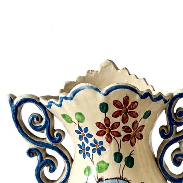 Earthenware - Two earthenware jugs - 19th century. Portuguese; late 19th century, polychrome glazed decoration with...