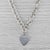 This necklace features an unmarked engravable heart lock hanging from a cable chain necklace. The necklace comes with a...