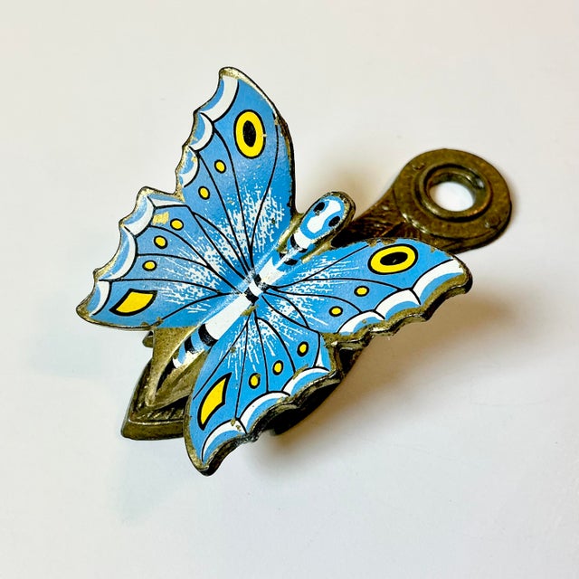 This little enamel painted brass butterfly paper clip is by Allied Brass out of Virginia. We love the bright sky blue and...