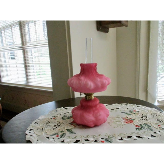 This vintage Fenton LG Wright mini pink satin puffy plume/rose oil lamp is a stunning piece of pottery and glass...